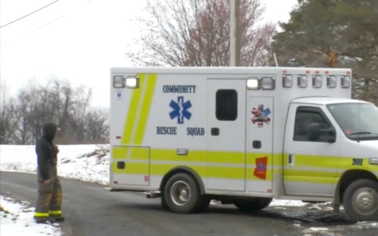 a man and an ambulance